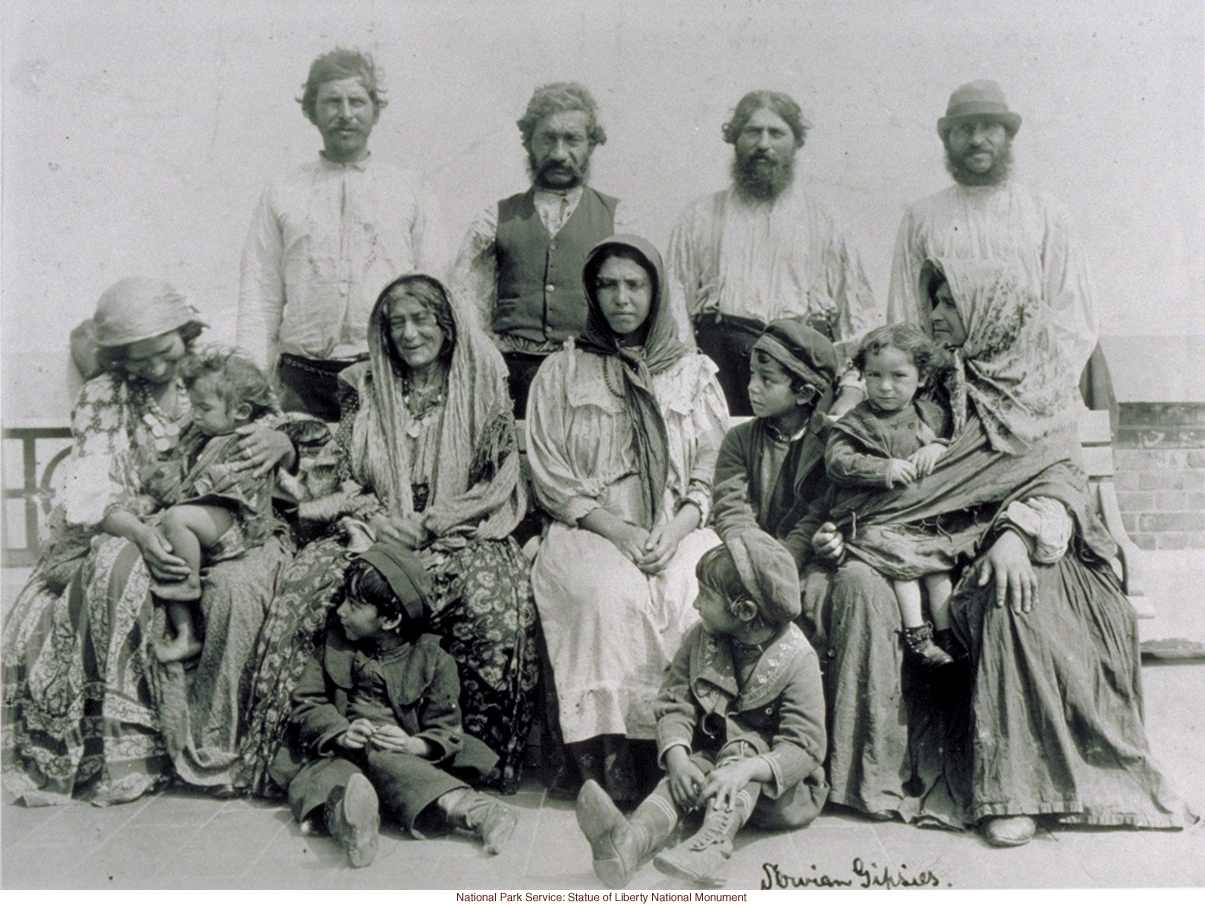 Slovenian Gypsy family at Ellis Island (by Augustus Sherman)