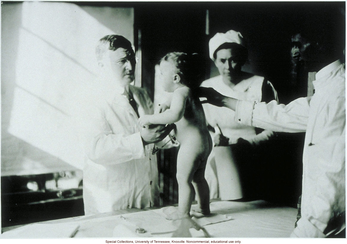 Infant being examined for a Better Babies Contest