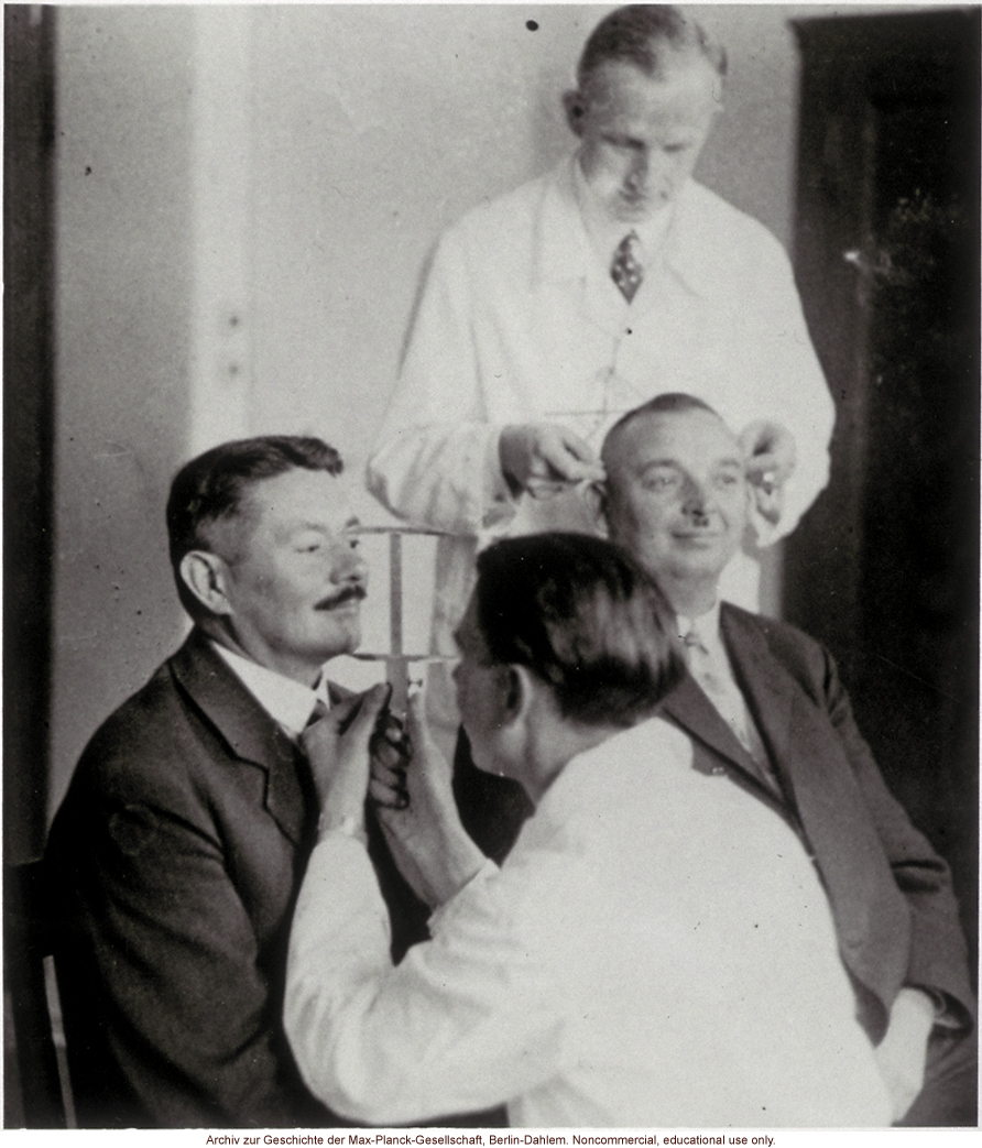 40-year-old male twins undergoing anthropometric study by Otmar Freiherr von Verschuer