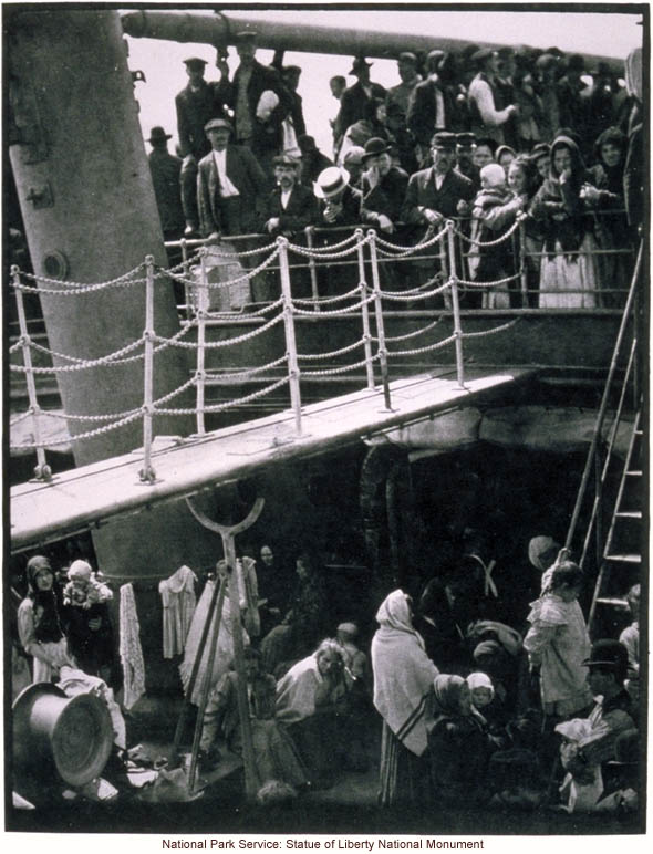 Immigrants in steerage (lower) on board steamship arriving at Ellis Island