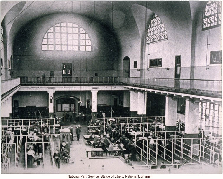 Immigrants being processed in the Great Hall at Ellis Island