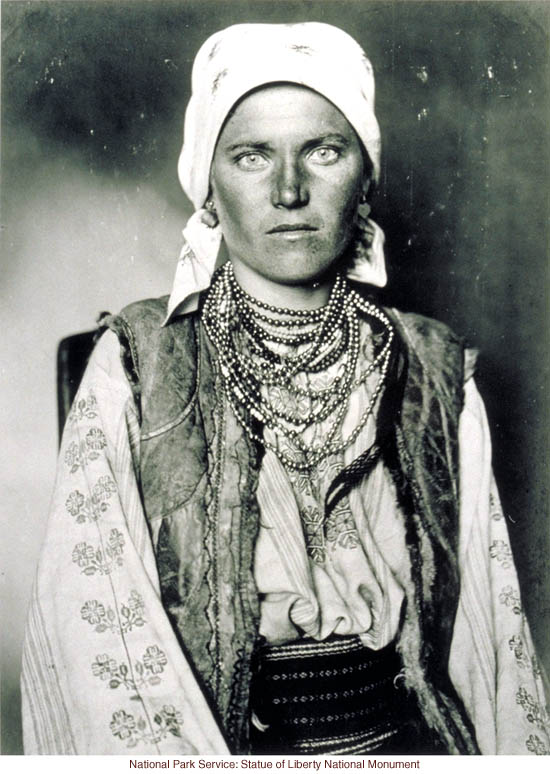 Gypsy woman at Ellis Island (Photograph by Augustus Sherman)