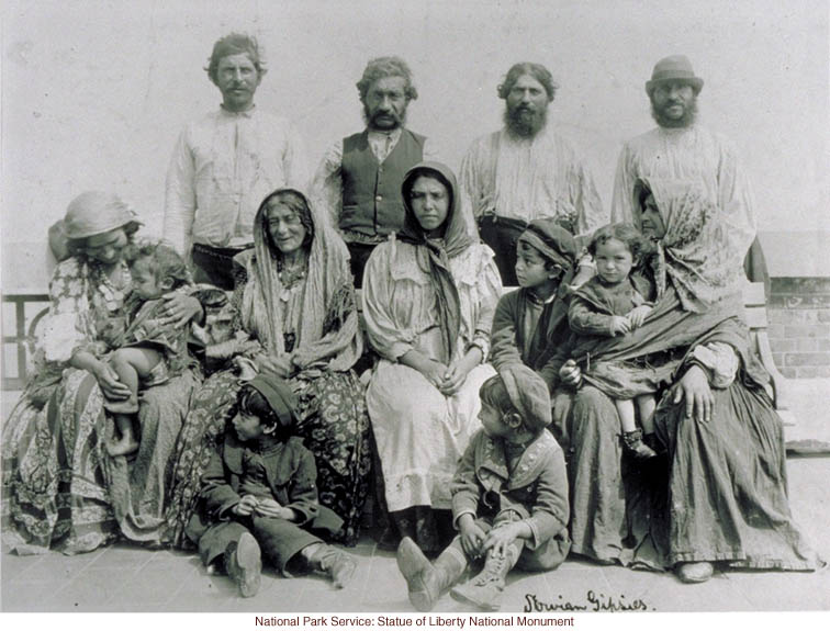 Slovenian Gypsy family at Ellis Island (by Augustus Sherman)