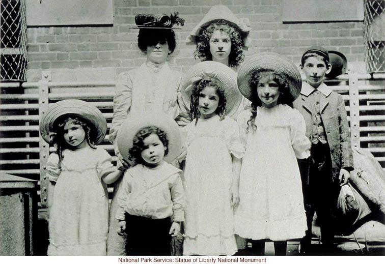English family at Ellis Island (Photograph by Augustus Sherman)