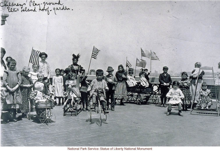 Immigrant children on &quote;roof garden&quote; playground at Ellis Island (Photograph by Augustus Sherman)