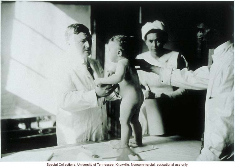Infant being examined for a Better Babies Contest