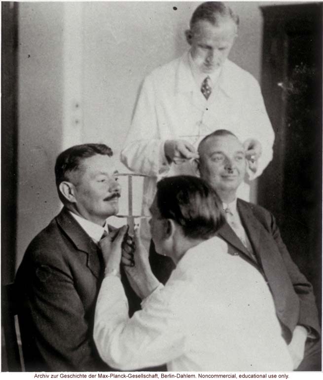 40-year-old male twins undergoing anthropometric study by Otmar Freiherr von Verschuer