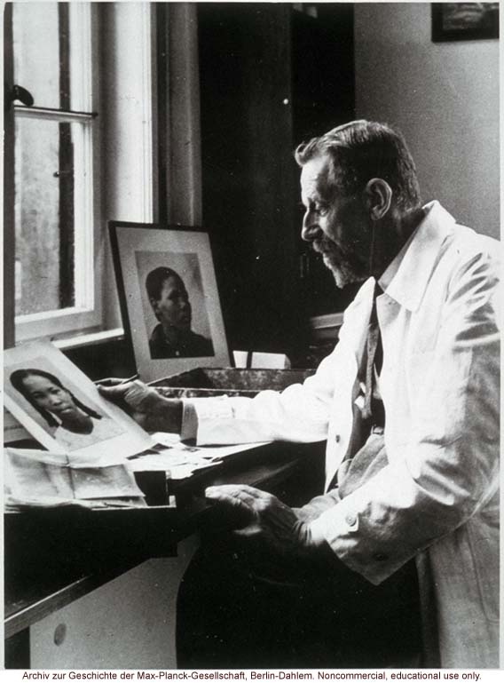 Eugen Fisher, Director of the Kaiser-Wilhelm Institute for Antropology, Human Heredity and Eugenics (1927-1942), looking at images of blacks